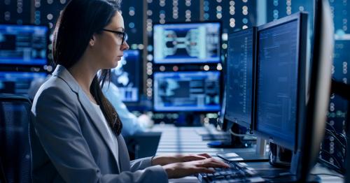 Female Engineer Controller Observes Working of the System. In th